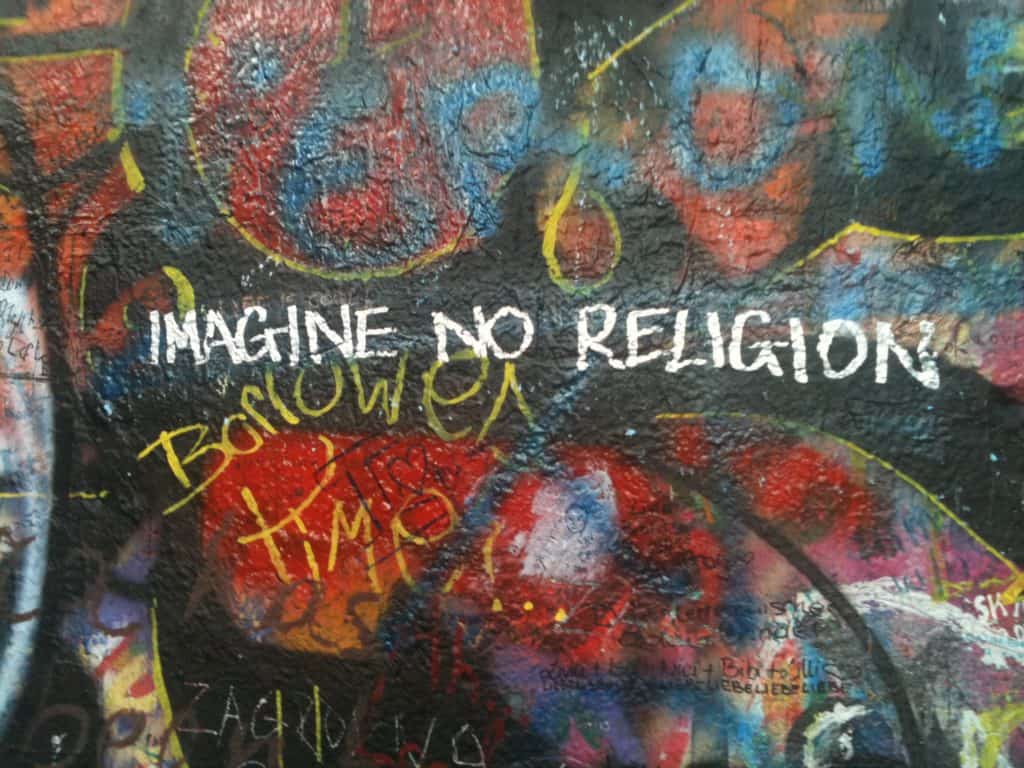 Street art that says Imagine No Religion.