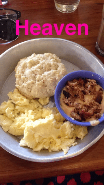 A plate of food with barbecue and mashed potatoes.