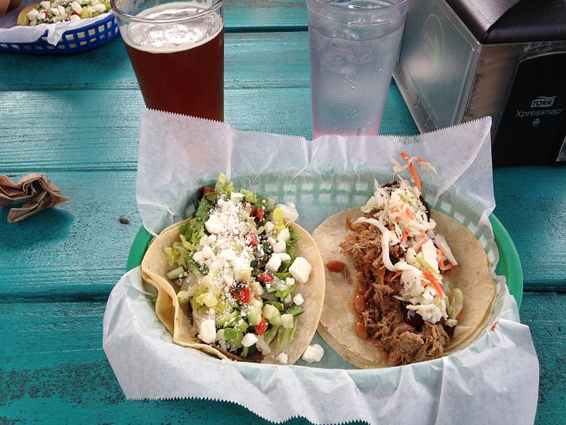 A tray with two tacos.