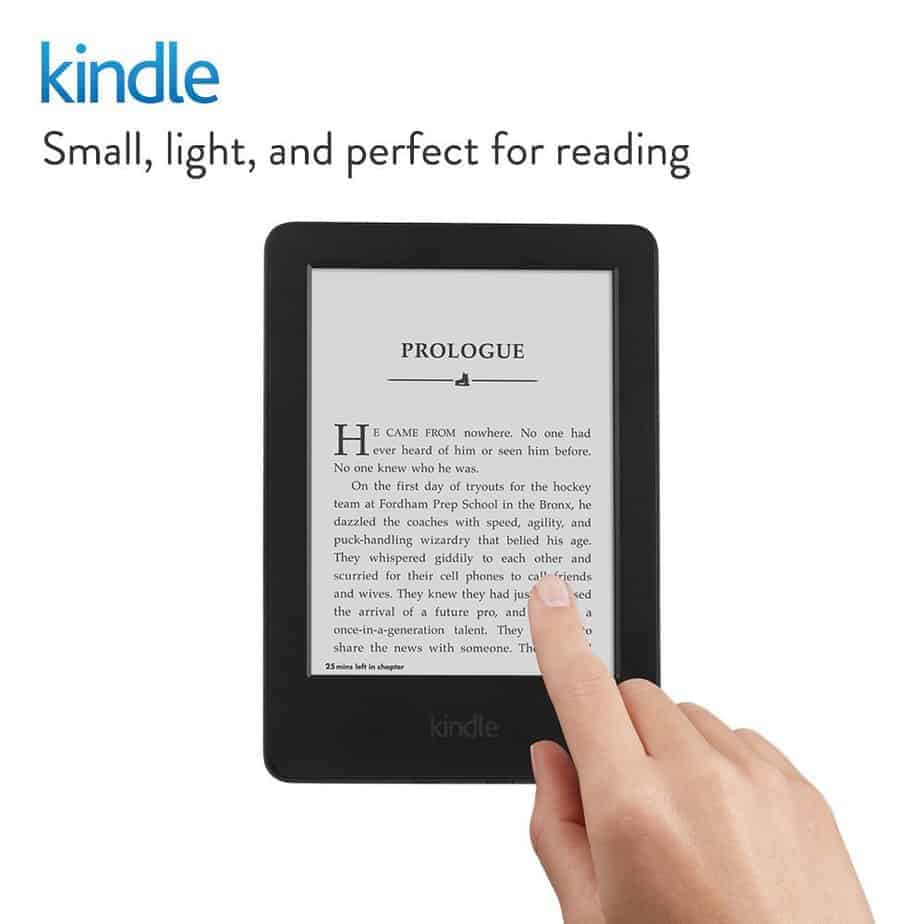 A person touches a tablet with a book pulled up. Text says Kindle. Small light and perfect for reading.