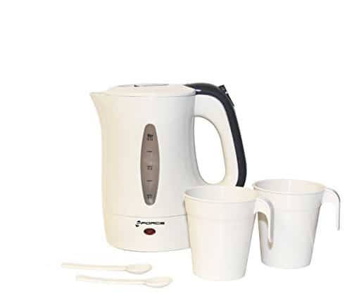 A white electric kettle stands next to two white cups and two plastic spoons.
