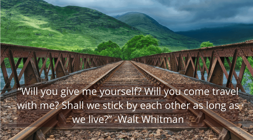 Image of a railroad bridge that says \"Will you give me yourself? Will you come travel with me? Shall we stick by each other as long as we live?\" - Walt Whitman