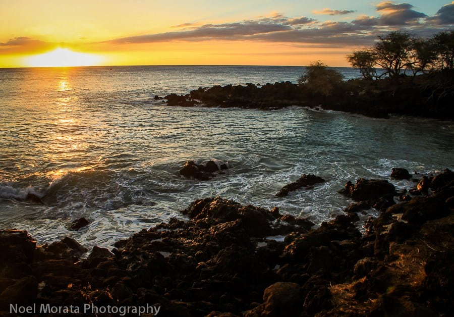 The ocean in Hawaii at a classic romantic winter getaway spot at sunset