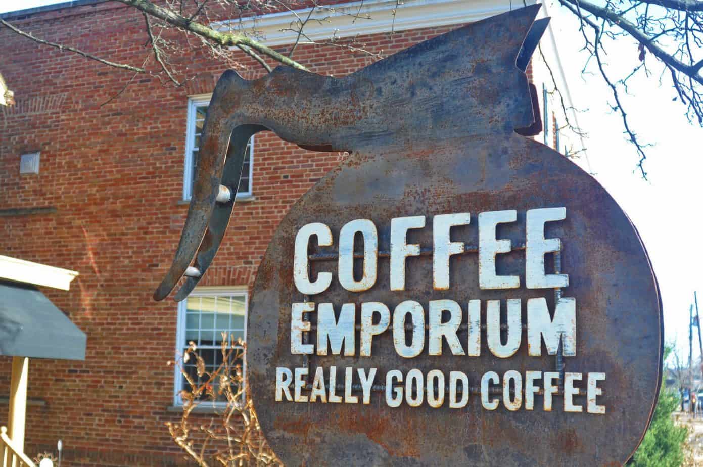 Big sign that says Coffee Emporium Really Good Coffee.