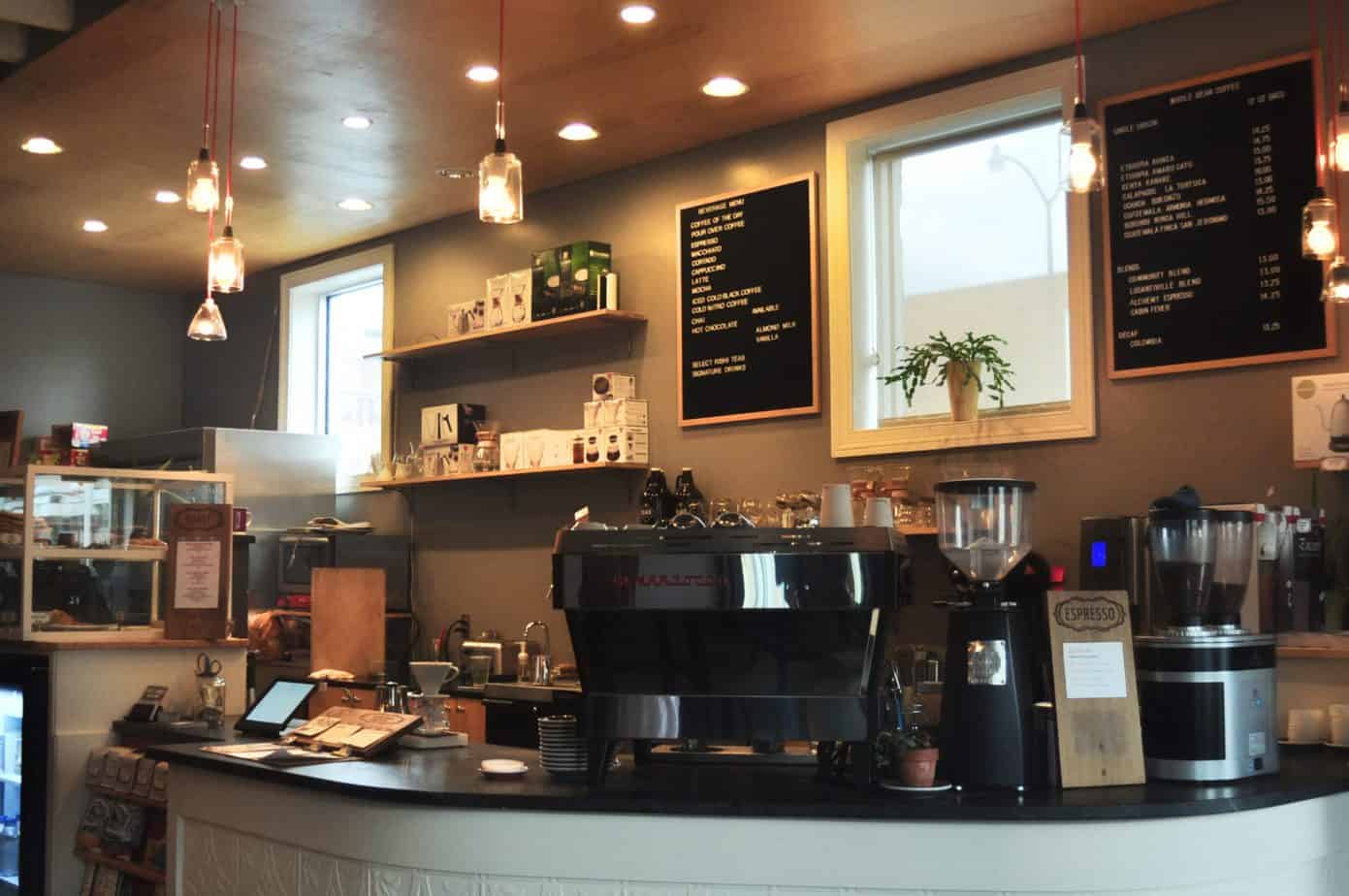 A counter covered in coffee equipment for baristas.