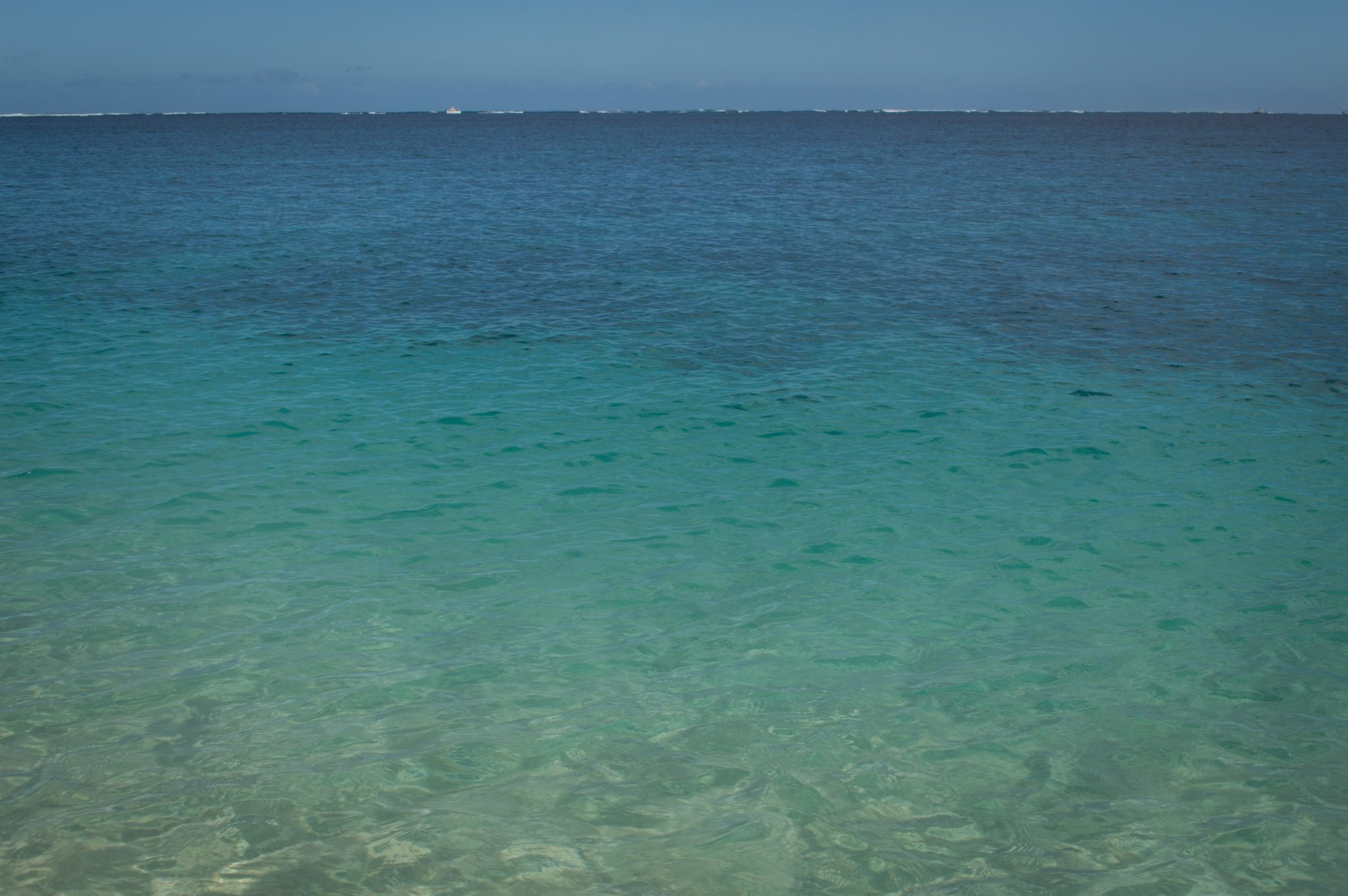 View of the turquoise ocean under a blue sky