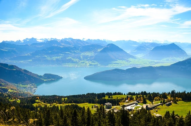 Aerial view of a mountain landscape with water.