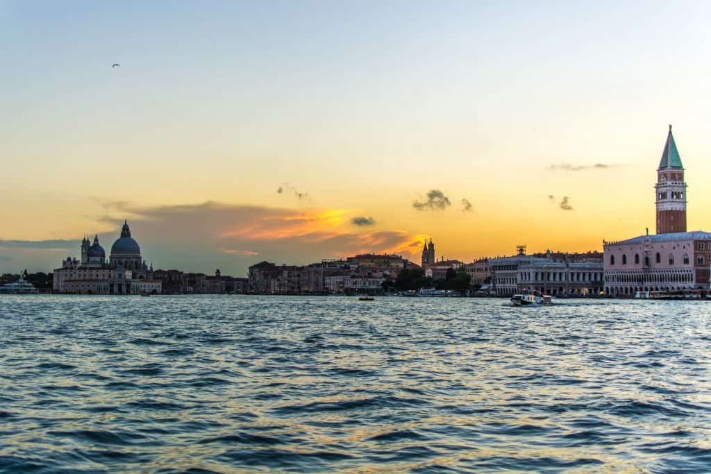 Sun sets over a body of water.