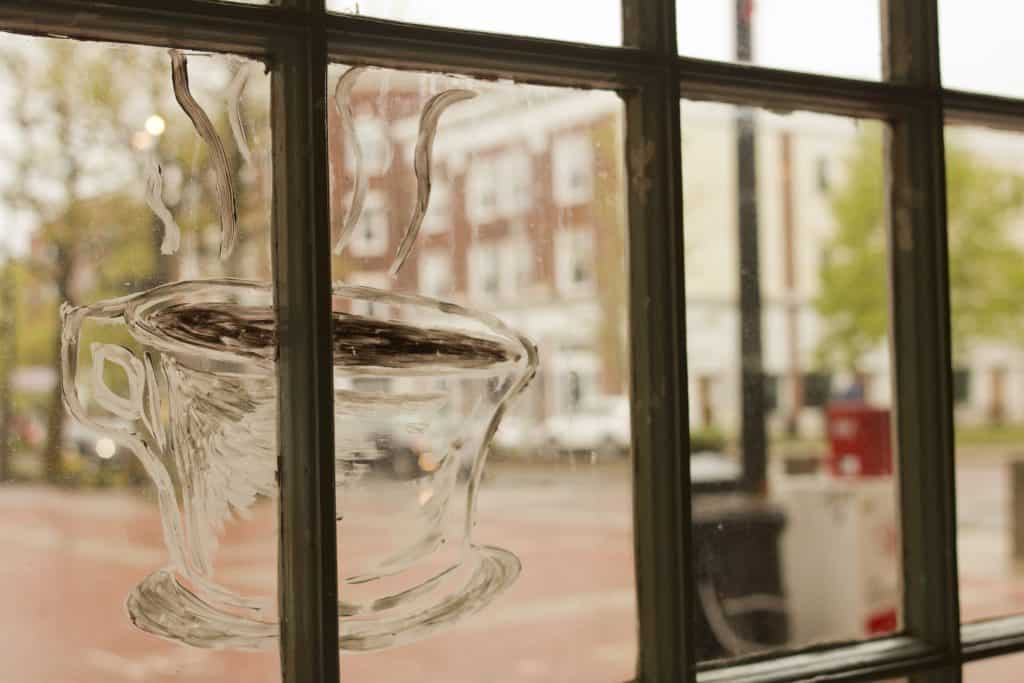 A cup of coffee drawn on a window