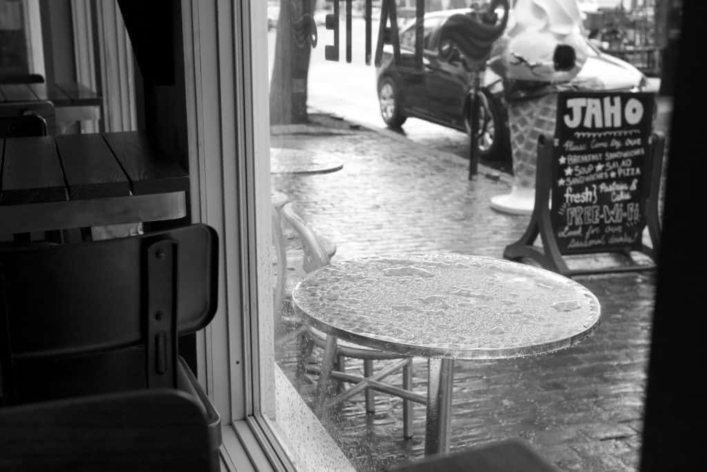View of a rainy table through a window