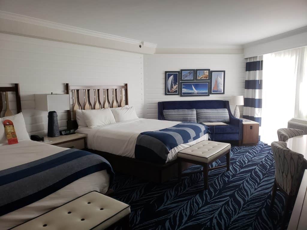A bedroom with a navy nautical theme.