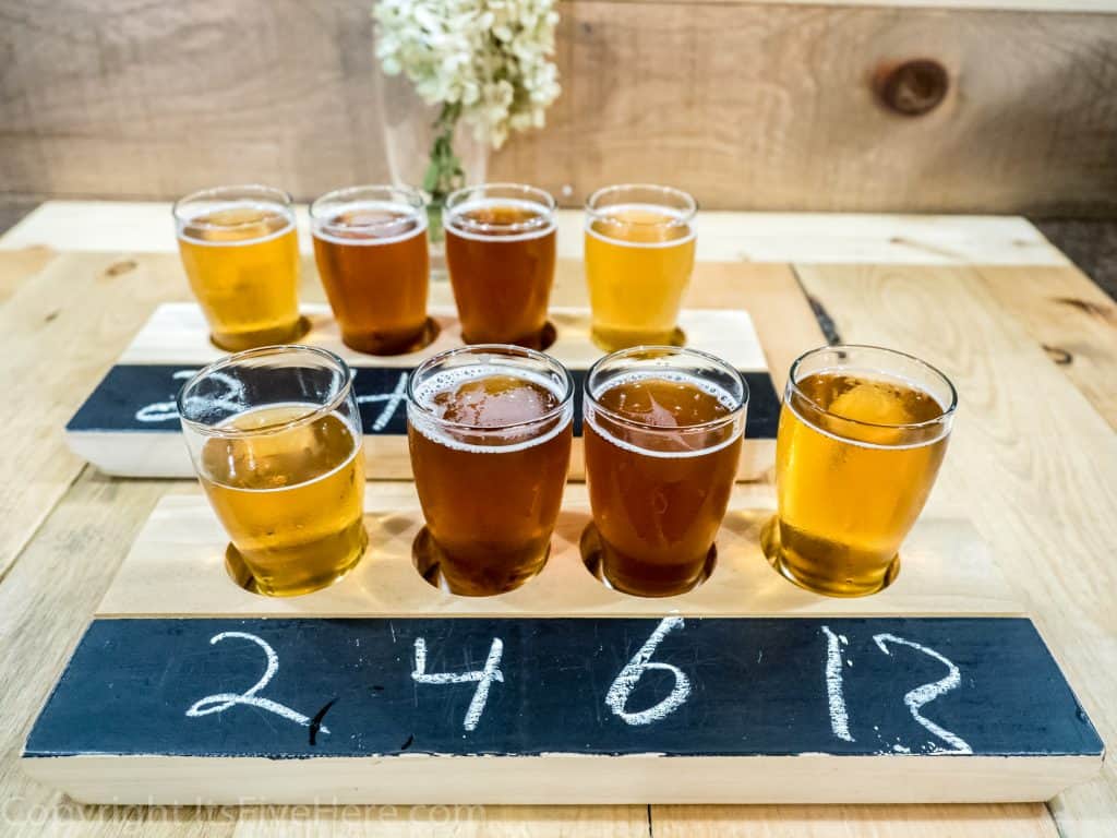 Two flights of alcohol on a table.