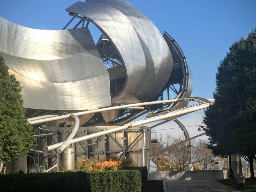 A sculpture on a sunny day during a romantic Chicago couples trip