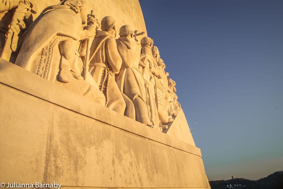 Close up of a statue of men.