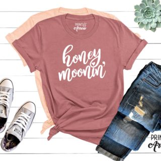 A pink shirt says "honey moonin'"