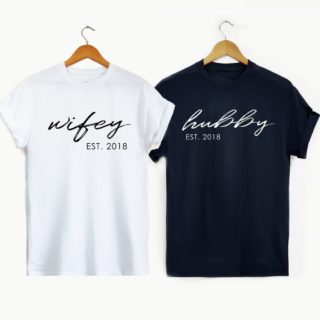A white t shirt says Wifey est. 2018. A blue t shirt says Hubby est. 2018.
