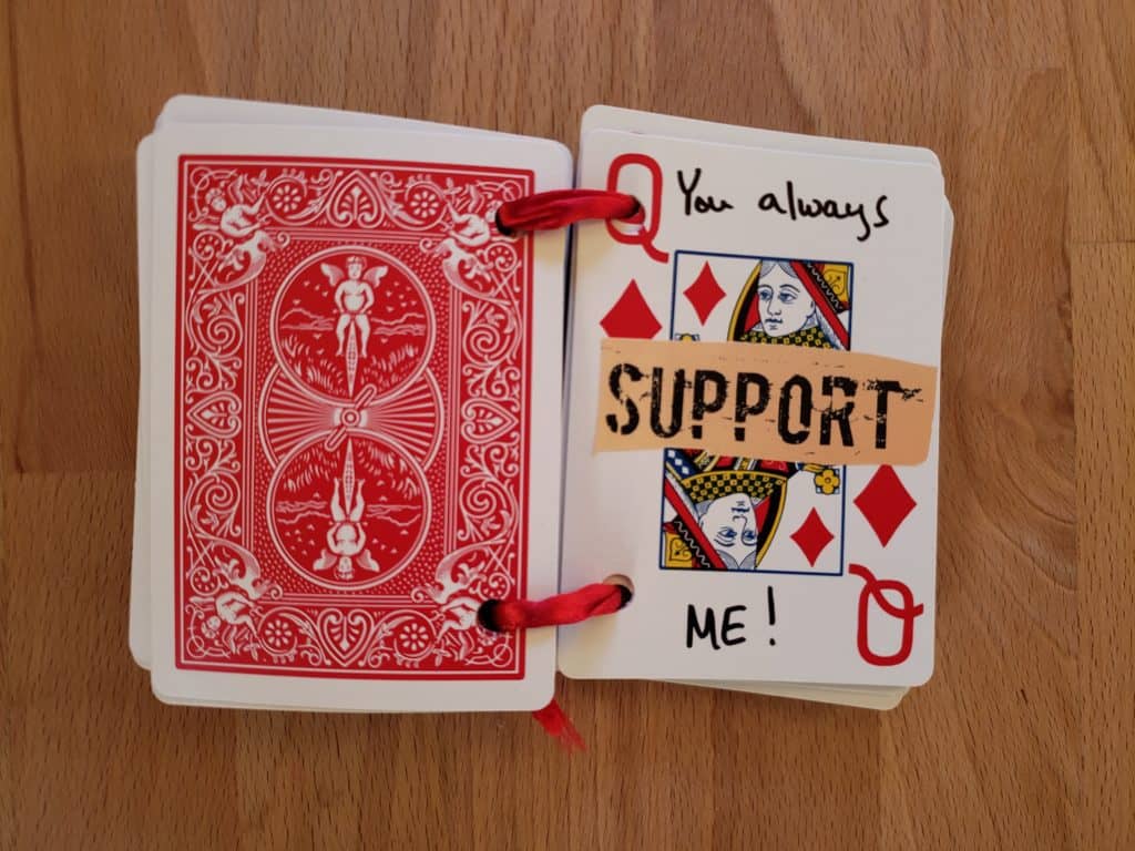 A set of cards is open that says You Always Support Me!