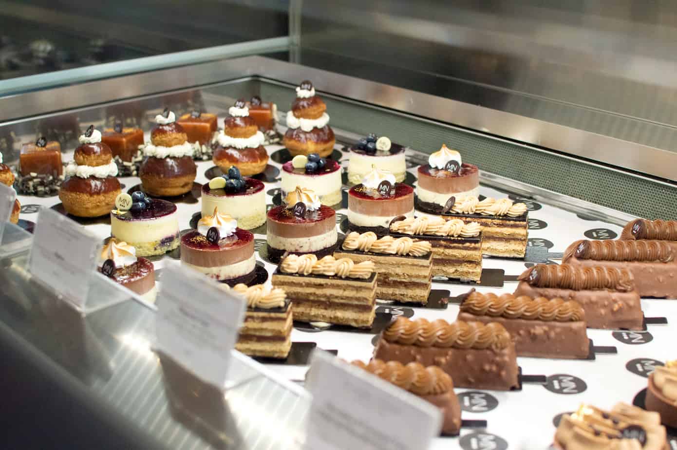 Rows of desserts in a display case