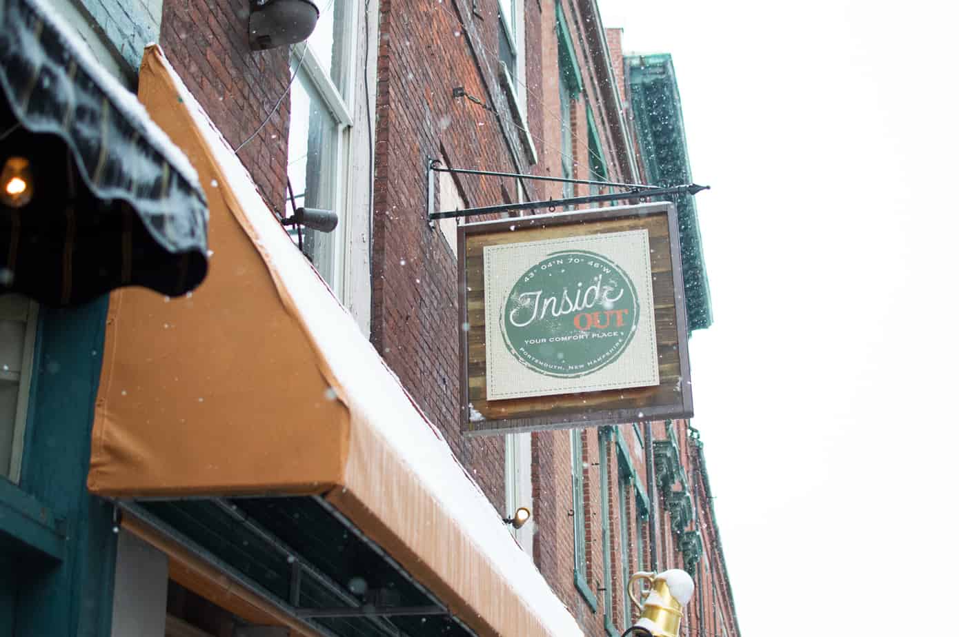 Looking up toward buildings from the sidewalk in New Hampshire