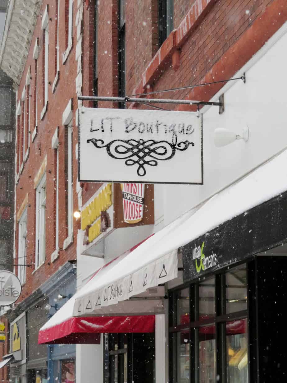 Row of stores with a sign reading \"Boutique\" in Portsmouth New Hampshire