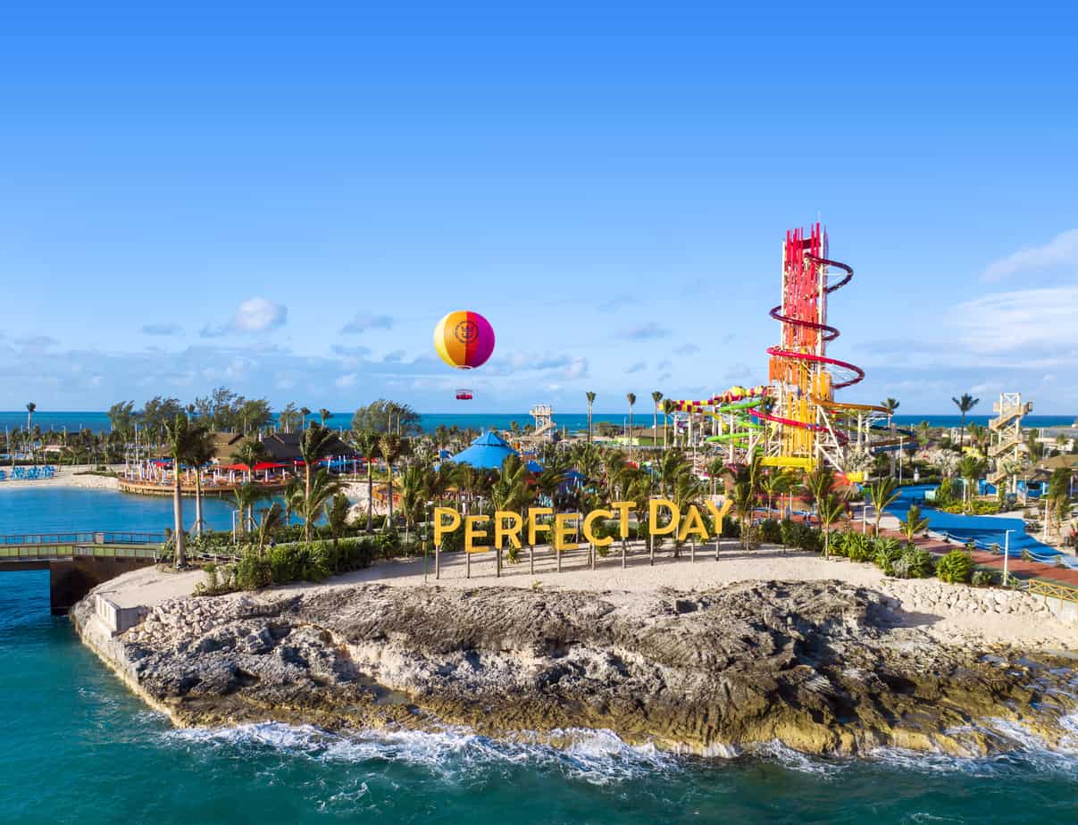 Water park rides on an island with a sign that says Perfect Day.