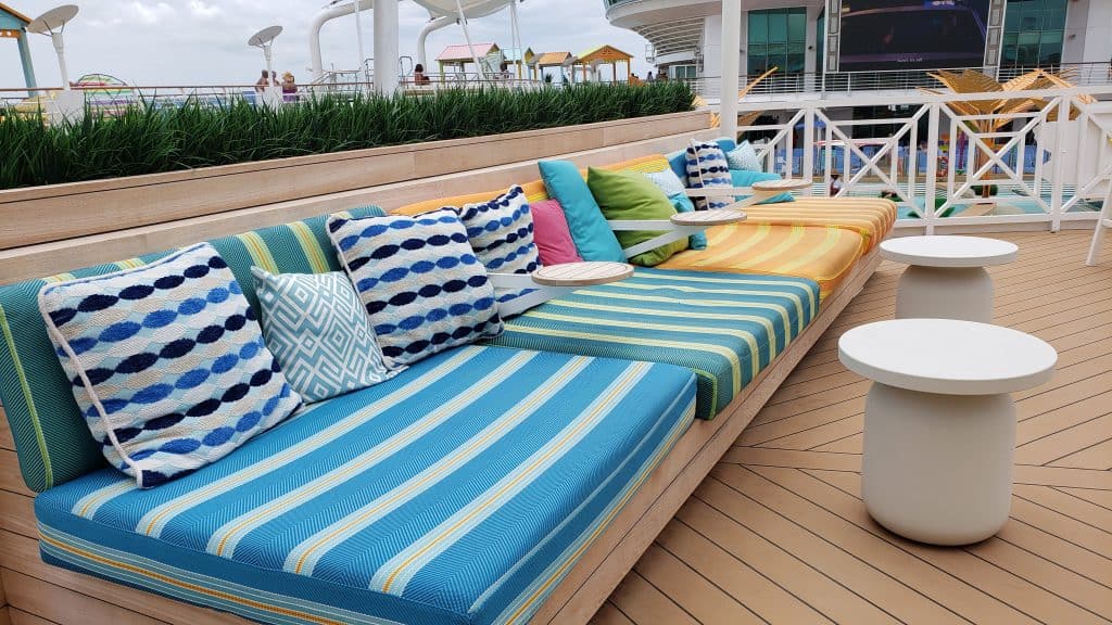 A sitting area with lush cushions and pillows.