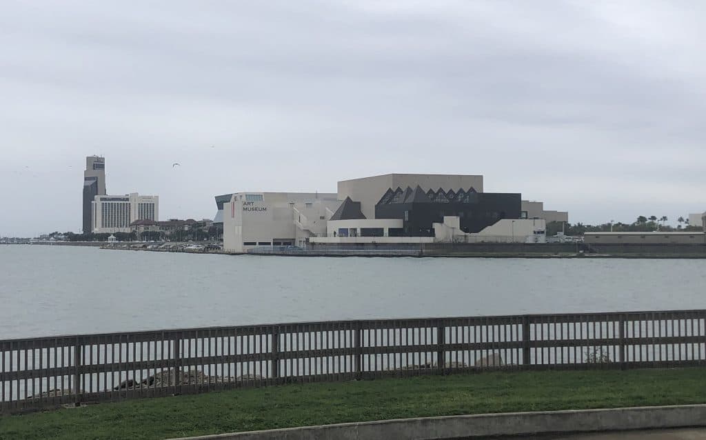 Calm body of water next to an art museum.