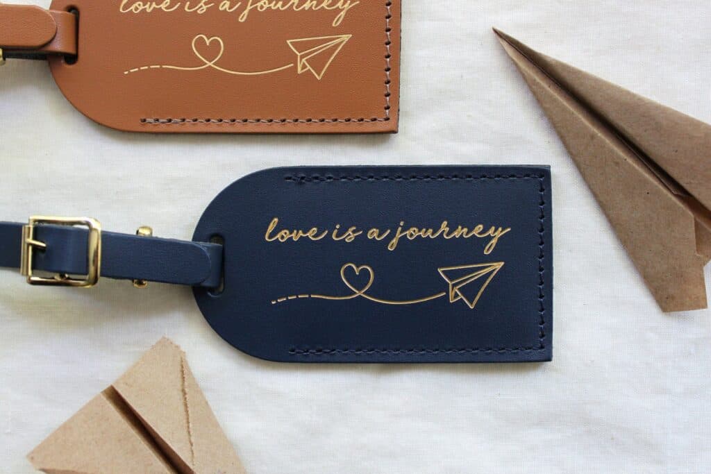 A leather piece says love is a journey.