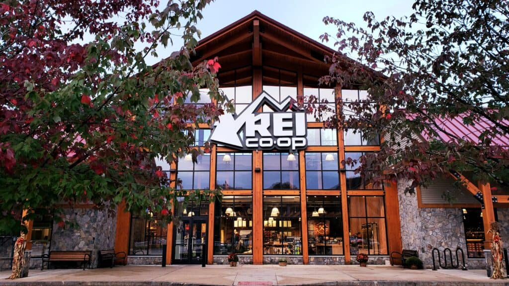 A big wooden building says REI Co-Op.