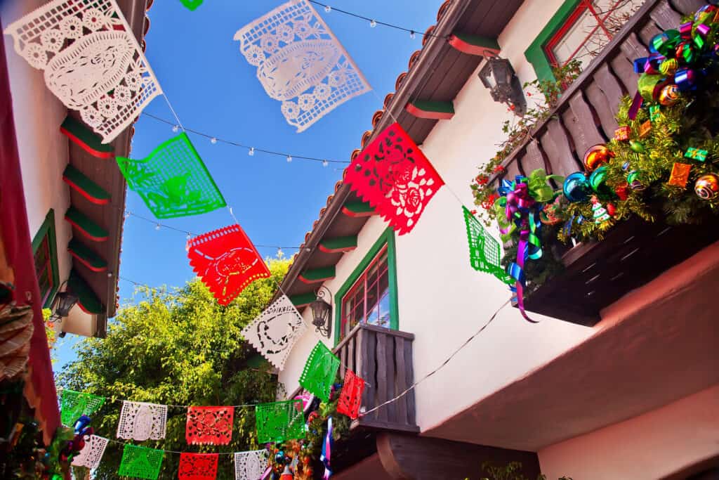 Red, green, and white decorations hang up outside.