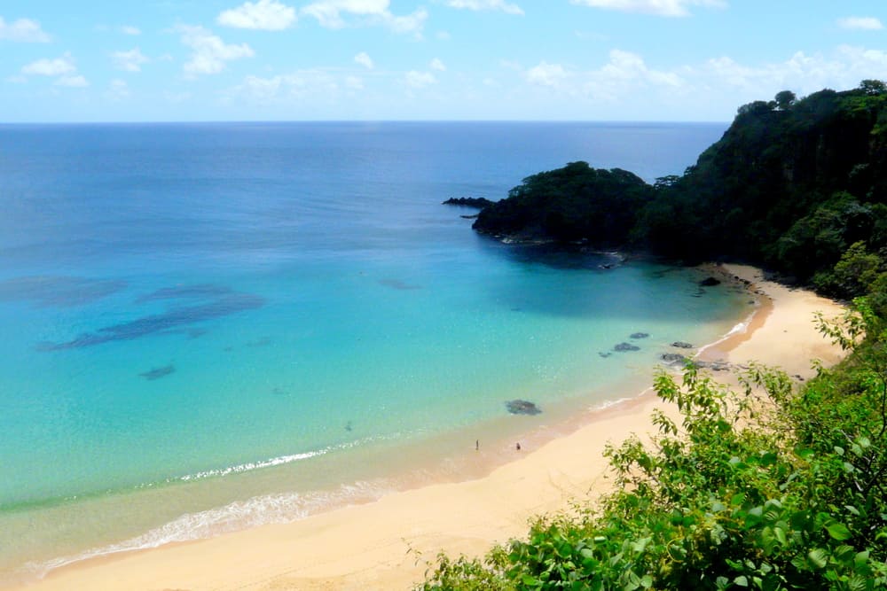 View of sand near the blue ocean.