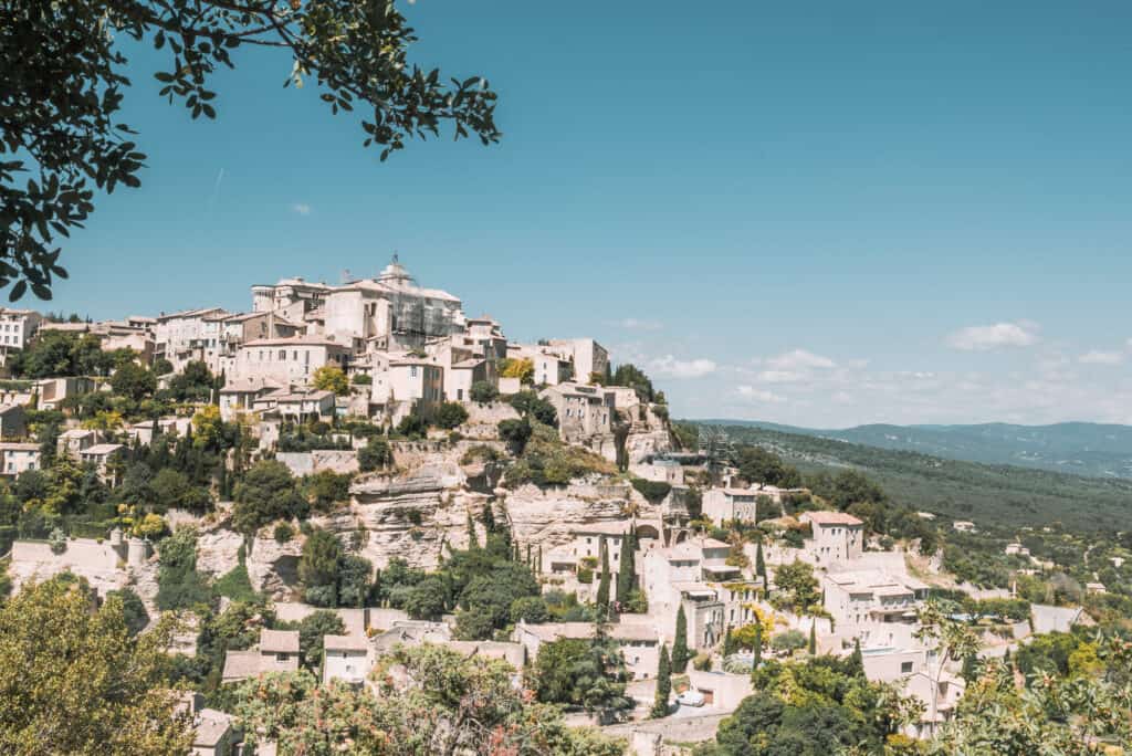 A municipality on a hill is surrounded by undecorous skies