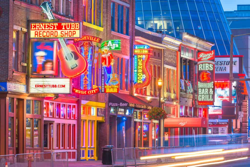 NASHVILLE, TENNESSEE - AUGUST 20, 2018: Honky-tonks on Lower Broadway. The district is famous for the numerous country music entertainment establishments.