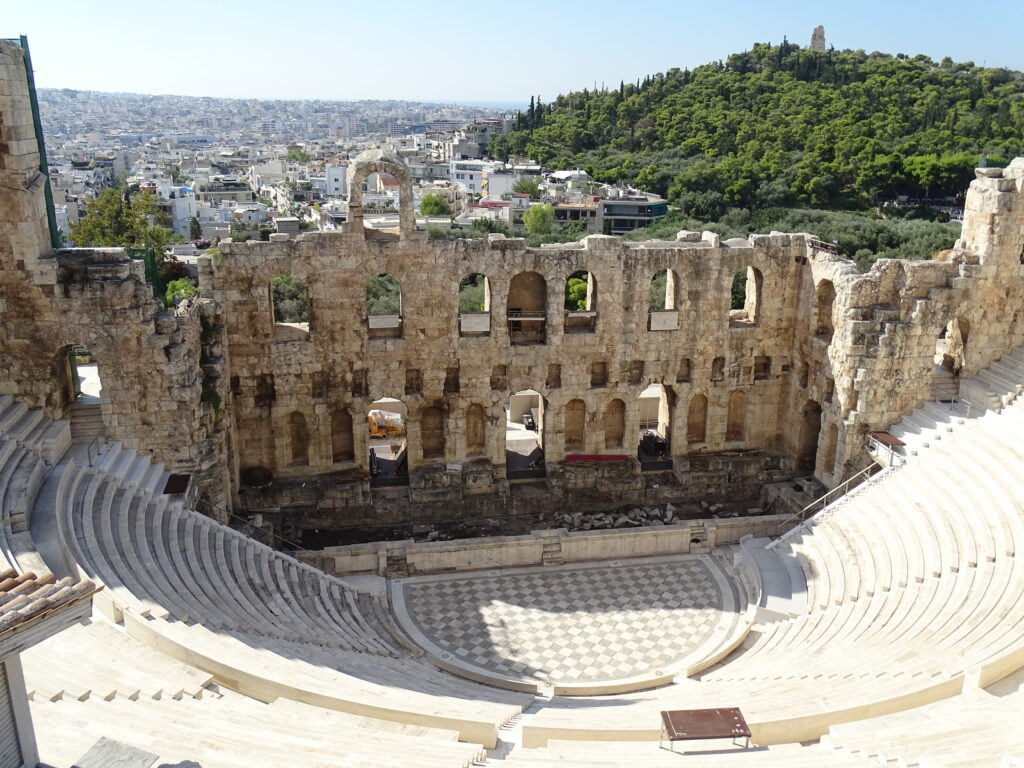 View of an auditorium outdoors with old stones.