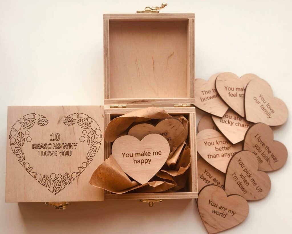 A wooden box says \"10 Reasons Why I Love You.\"